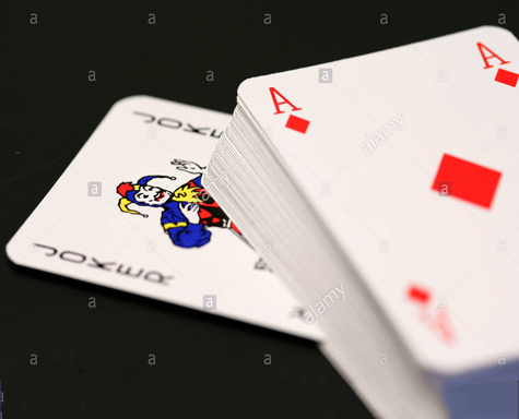 deck-of-playing-cards-with-red-ace-of-hearts-on-top-and-the-colourful-APMNB8